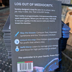 Back cover of a book with motivational text.